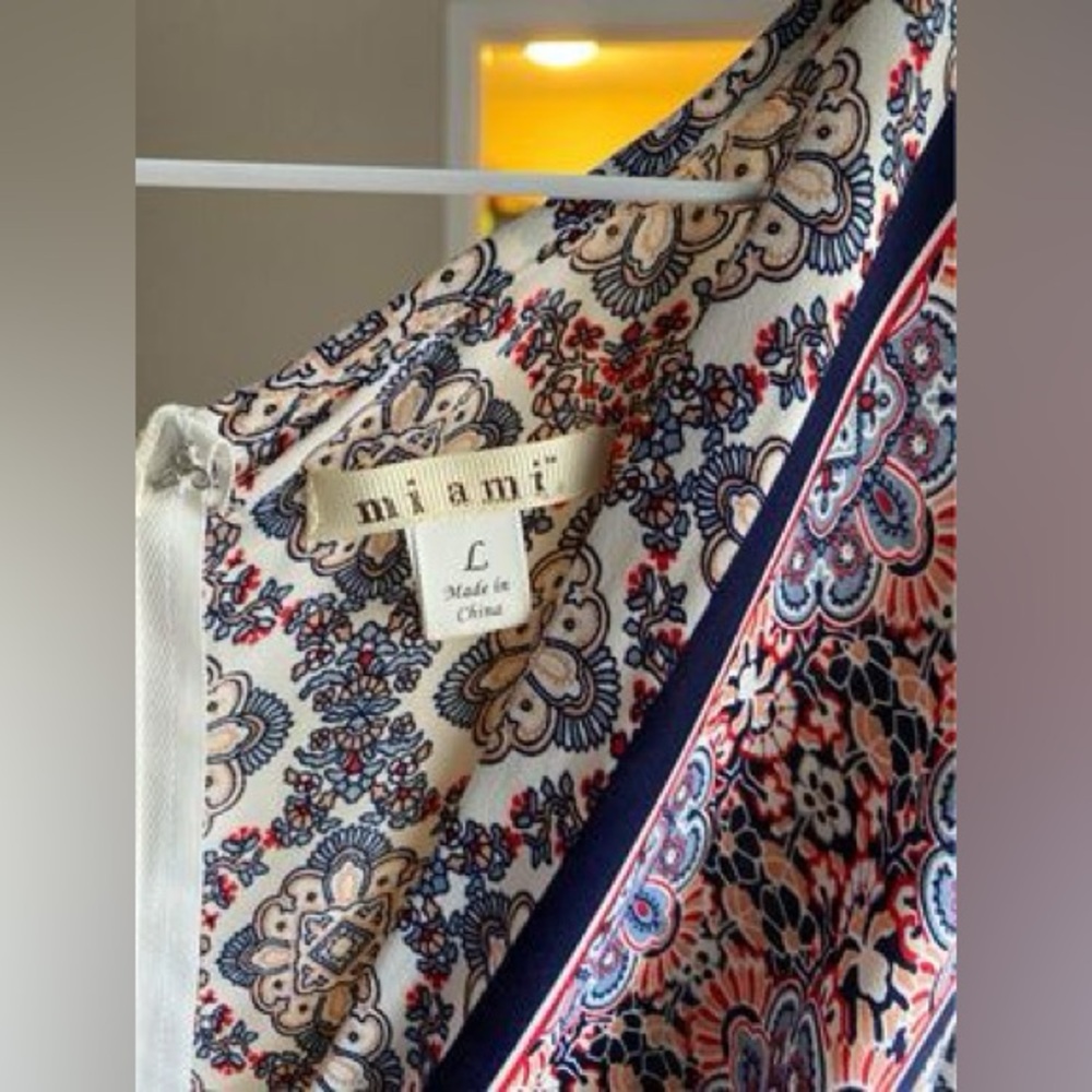 Large Romper that I have worn twice. Silk like material